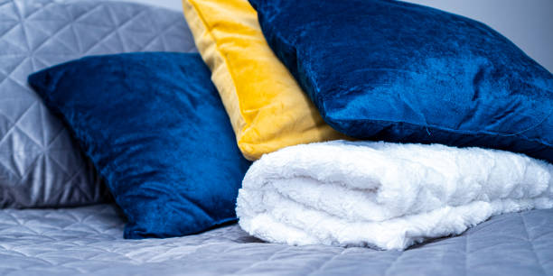 The interior and style of the bedroom is in a modern, Scandinavian style.